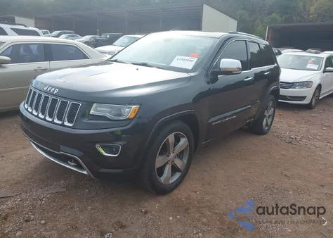 2014 Jeep Grand Cherokee Overland z USA, uszkodzony, nr VIN 1C4RJECG9EC125403